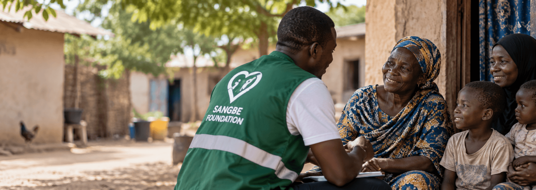Sangbe Foundation engaging with a family in the community